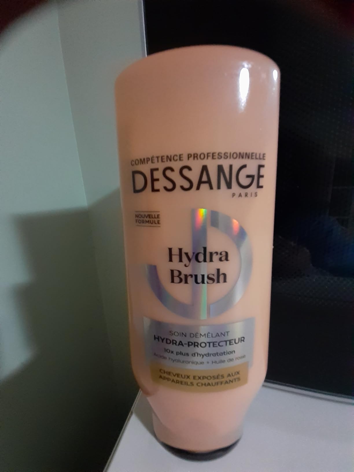 Top avec la brosse lissante